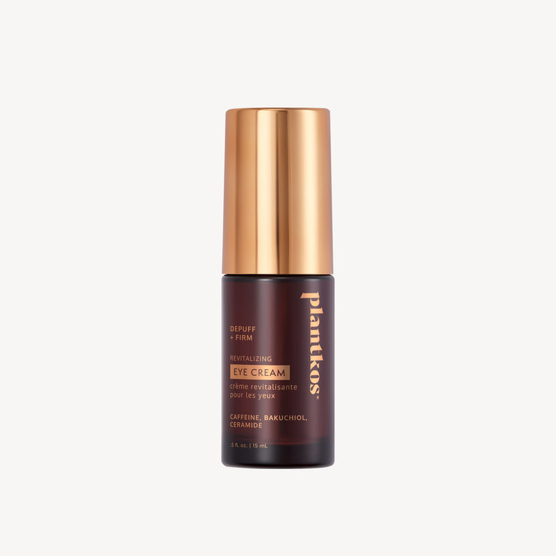 Skincare bottle with gold cap and brown body on a white background
