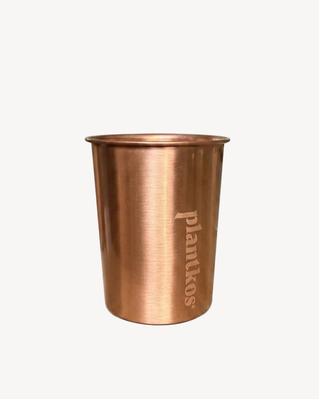 Copper cup with 'plantkos' branding on a white background